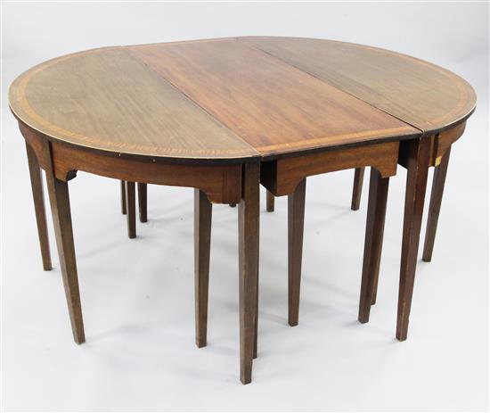 George III mahogany and satinwood banded extending dining table, extended 10ft 10in. x 4ft 4in. x 2ft 4in.(-)